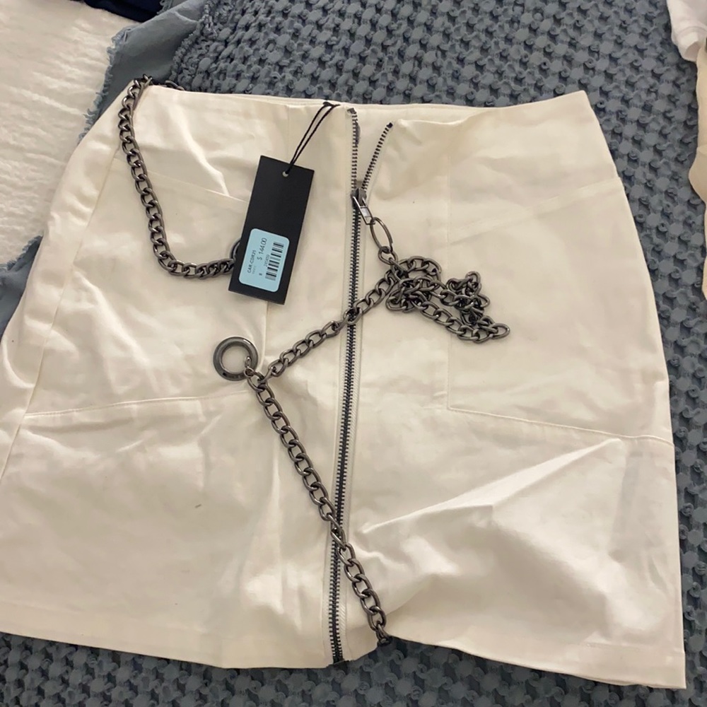 Carmar white denim skirt w chains